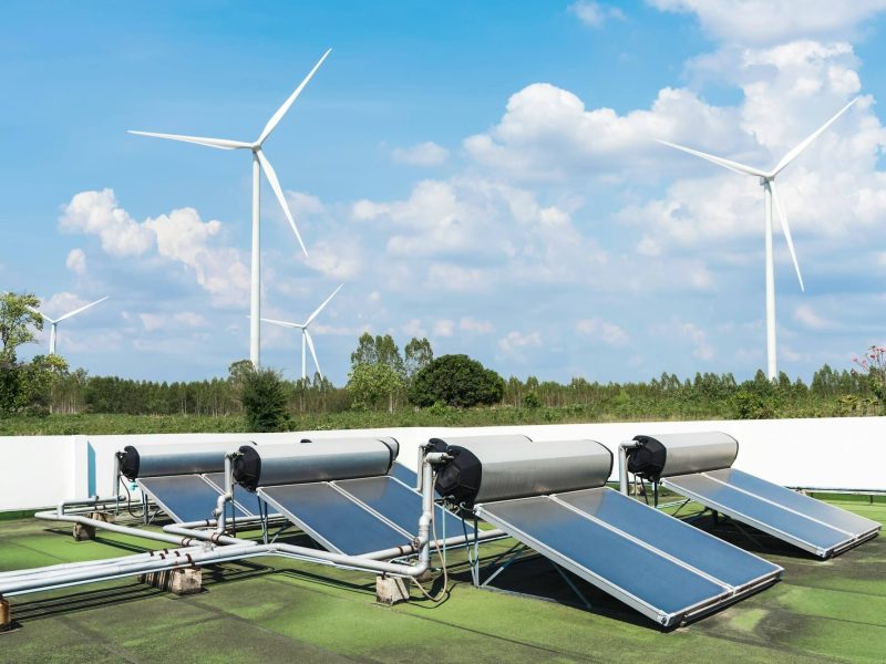 solar-cell-energy-panels-and-wind-turbines-with-blue-sky-green-energy-.jpg